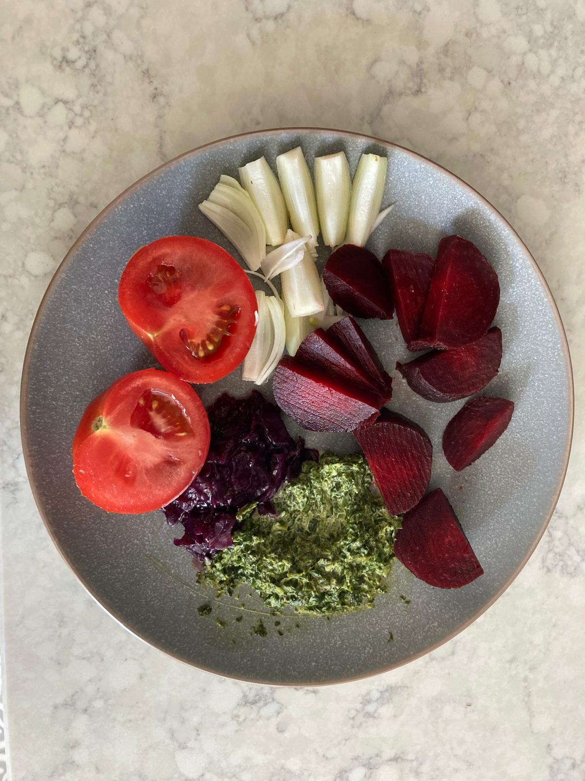 Beetroot, high in nitrates, helps lower blood pressure by improving blood flow and relaxing blood vessels.